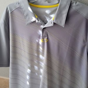 Used, Oakley Hydrolix polo, silver and yellow XL